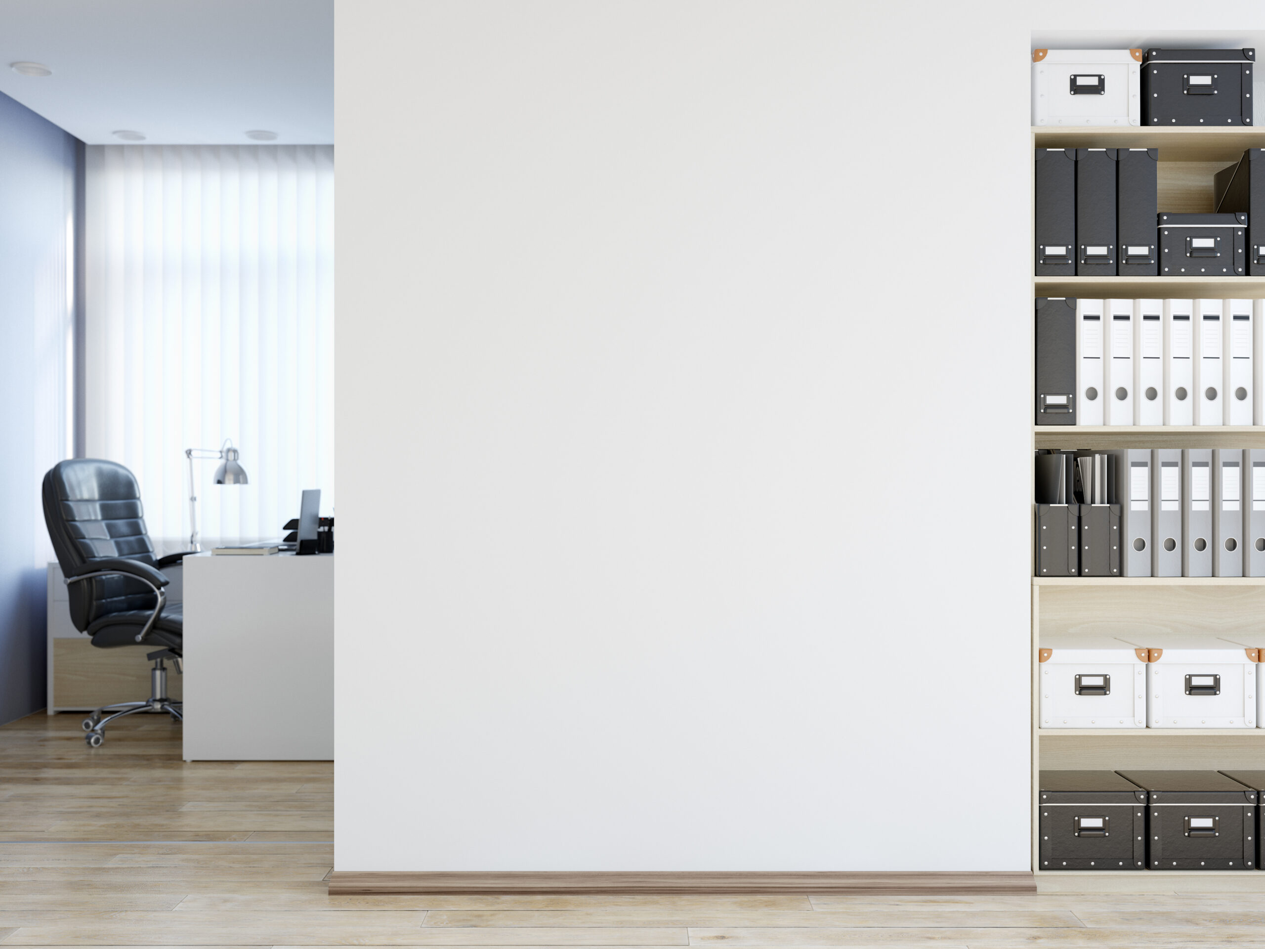 Modern office with white walls and filing cabinet.