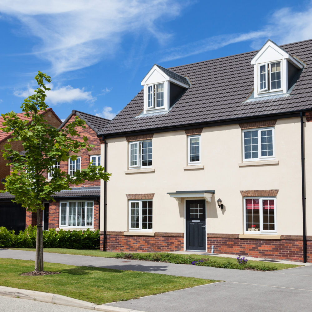 New build property in the UK on sunny street.