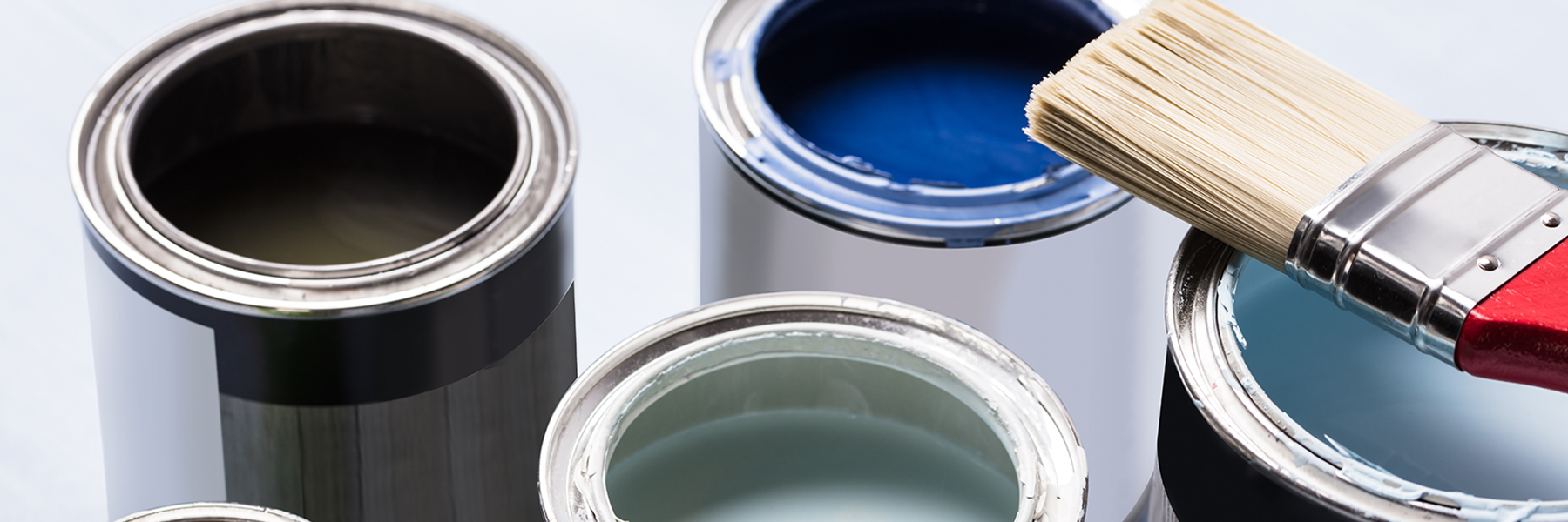 Closeup of open paint pots.